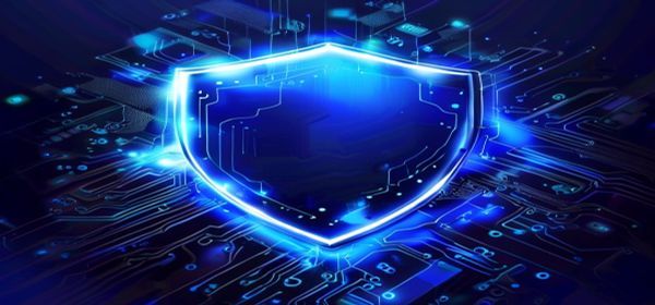 Glowing blue digital shield on circuit board, cybersecurity concept