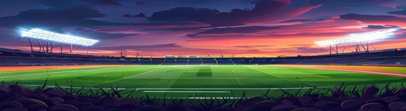 Champions League stadium floodlights illuminating an empty pitch at dusk