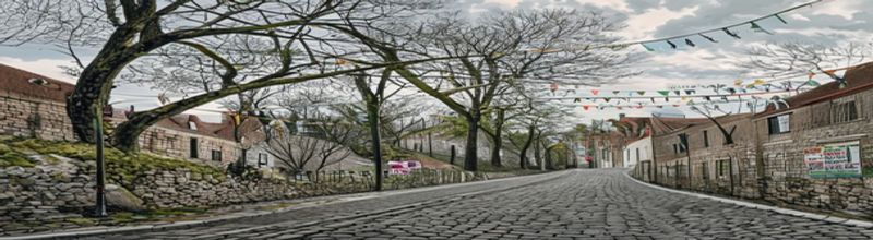 A steep narrow cobbled hill climb in Belgium lined with metal crowd barriers, the road curving upward under a grey spring sky, a scatter of green paper flags on the grass verge, chalk race-markings on the cobbles, no spectators visible in the foreground